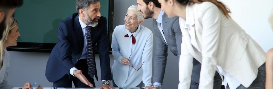 Creative business people working on business project in office